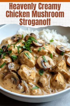 a white bowl filled with chicken and mushroom stroganoni next to rice on a table