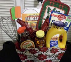 a basket filled with food and cooking utensils