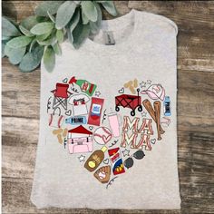 a white t - shirt with the words i love maine printed on it and various items