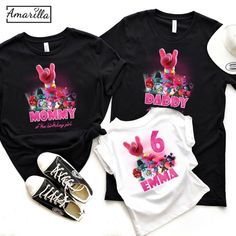 two t - shirts with the words mommy and baby printed on them next to sneakers