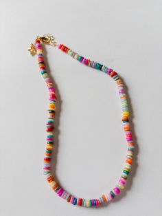 Handmade beaded necklace with colorful gemstone heshi beads Perfect addition to summer stacks Bohemian Jewelry With Colorful Heishi Beads, Colorful Bohemian Heishi Beads Jewelry, Bohemian Colorful Heishi Beads Jewelry, Multicolor Large Beaded Necklaces For Vacation, Multicolor Large Beads Necklace For Vacation, Colorful Bohemian Jewelry With Letter Beads, Colorful Bohemian Letter Beads Jewelry, Multicolor Heishi Beads Jewelry With Colorful Beads, Bohemian Heishi Letter Beads