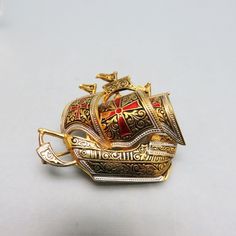 Spanish Damascene Galleon Brooch, Vintage, Small Size - Etsy Formal Gold Enamel Brooches, Collectible Engraved Gold Brooches, Ornate Gold Collectible Brooches, Gold Engraved Collectible Brooches, Gold Engraved Brooches For Collectors, Victorian Gold Enamel Pin, Victorian Style Gold Enamel Pin, Collectible Gold Enamel Pins, Antique Gold Lapel Pin Collectible