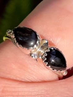 Black Onyx Ring Happiness Black Onyx is a powerful protection stone. It can transmute negative energy and aids in the development of emotional and physical strength. Black Onyx can be used to encourage happiness and good fortune. This stone helps one to become the master of their own fate. Sterling Silver Ring is a size 6. Black Spiritual Round Rings, Black Obsidian Rings For Gift, Black Obsidian Gemstone Ring, Black Gemstone Rings For Healing, Black Spiritual Rings With Gemstone, Black Oval Spiritual Rings, Black Spiritual Gemstone Rings, Spiritual Black Onyx Rings, Black Spiritual Jewelry For Anniversary