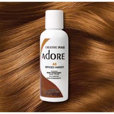 Pack of 1 Adore Hair Color - please verify color name in the Product Title Transform your hair with the vibrant and long-lasting hues of Creative Image Adore Semi-Permanent Hair Color. This innovative hair dye is designed to infuse each strand with rich, radiant color while maintaining the health and integrity of your hair. Free from harsh chemicals like ammonia, peroxide, and alcohol, Adore provides a gentle yet effective coloring experience that leaves your hair feeling soft, silky, and full of life. Adore’s unique formula is enriched with natural ingredients that nourish and condition your hair, ensuring that it remains healthy and vibrant. The semi-permanent nature of the dye means that it gradually fades over time, allowing you to experiment with different shades without the long-term Adore Hair Color, Brazil Hair, Semi Permanent Hair Color, Hair Product, Permanent Hair Color, Semi Permanent, Hair Dye, Color Names, Dyed Hair