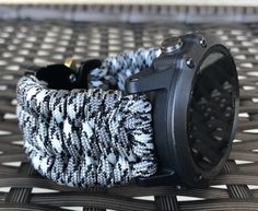 "FREE USPS PRIORITY MAIL SHIPPING FOR DOMESTIC US ORDERS (Includes U.S. Military APO/FPO Address Overseas) Thank you for visiting our shop \"Cording 2U\". A veteran owned business. Handcrafted Paracord wearables customized \"According To You\". Handcrafted with 100% Nylon Paracord \"MADE IN USA\" Our Products include: 🔹Custom handcrafted watch bands according to your wrist size, style, and color of choice. If you don't see it in our page yet, please contact us and we can discuss your options. ? Durable Silver Watch Bands For Outdoor, Silver Durable Watch Bands For Outdoor, Outdoor Durable Silver Watch Bands, Custom Black Watch Accessories For Outdoor, Paracord Watchband, Paracord Watch, Paracord Armband, Handmade Watch Bands, Garmin Fenix