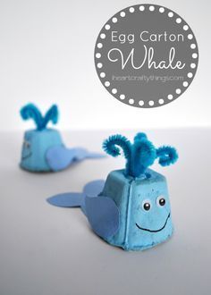 two little blue sea creatures made out of toilet paper