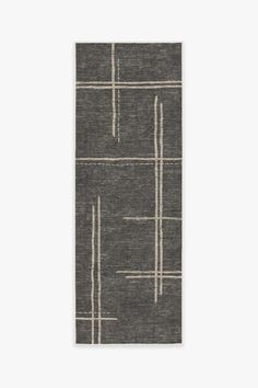 a black and white rug with lines on it