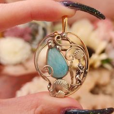 Absolutely stunning, hand crafted, one of a kind, Larimar Magical Hummingbird Pendant .925 Silver with 14K Gold. Larimar Metaphysical Properties ♡ Chakra: Throat ♡ Brings calmness, healing, peace, and tranquility ♡ Enhance communication & manifests your higher purpose ♡ Provides connection with to the Divine Feminine ♡ Releases emotional imbalances, stress and trauma ♡ Supports during pregnancy, birthing and post-partum You will receive the exact pendant pictured. Please note: As it is a natural Higher Purpose, Chakra Throat, Divine Wisdom, Hummingbird Pendant, Post Partum, Line Patterns, The Divine, Divine Feminine, Belly Button Rings