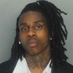 a young man with dreadlocks is shown in this muggy mugshot photo