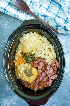 the meal is prepared and ready to be eaten in the crock pot on the table