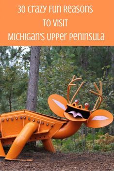 an orange sculpture with the words 30 crazy fun reasons to visit michigan's upper peninsula