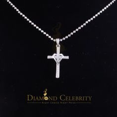 DIAMOND CELEBRITY Custom Label :12119W-A10DC Style : Necklaces & Pendants,Womens Necklaces & Pendants,Men's Chain Necklaces,April Gemstone Pendant Necklaces, This new  is a stylish unisex piece made of 925 sterling silver with a White metal color. It features a 0.22ct AAA cubic zircon April birthstone, giving it a good shiny appearance similar to a real diamond. The CROSS and Heart pendant weighs 2.48 gm and is designed for both women and men, making it suitable for all genders. Please note that the chain is not included, and the bell size for the chain is 3X2. The CROSS and Heart pendant comes in new condition with tags and original packaging, and the metal is rhodium plated and nickel-free for an enhanced appearance and reduced tarnishing. Detailed pictures are available for more informa Luxury Silver Cubic Zirconia Cross Necklace, Luxury Sterling Silver Cross Diamond Necklace, Luxury White Sterling Silver Cross Necklace, April Gemstone, Pendant Making, Mens Chain Necklace, April Birthstone, Custom Label, Chain Necklaces