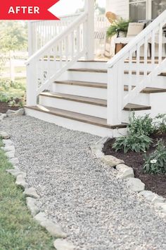 a white porch with steps leading up to it and flowers growing on the ground below