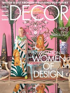 the cover of decor magazine with a woman sitting on a chair in front of a pink wall