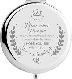 a compact mirror with the words to my dear niece i love you in silver lettering