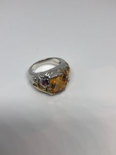 Unusual cut of citrine Sterling Filigree gold finished lizards and small rubies in Setting Handmade Size 7 Can be resized, my jeweler charges a $10 fee All rings are shipped in a nice gift box. Check out our over a THOUSAND great reviews Engraving is $4 per letter and is not always perfect depending on the piece. It can take a few days if the jeweler is busy. This is payable to Paypal Judithsltd@gmail.com Yellow Sapphire Rings With Gemstone Accents As Gift, Multi-stone Yellow Sapphire Jewelry Gift, Unique Citrine Rings With Gemstone Accents, Unique Citrine Rings With Accent Stones, Citrine Jewelry Stamped 925, Unique Multi-stone Citrine Rings, Black Rhodium Ring, Gothic Ring, Gothic Rings