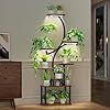 a lamp that is on top of a table in a room with plants and other things