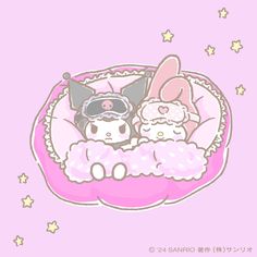 two cute little kittens sitting in a pink cat bed with stars on the wall