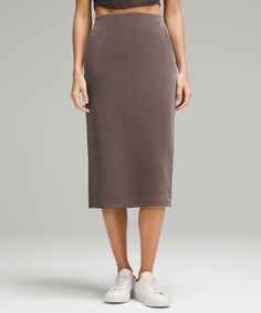 Feel it to believe it. From running errands to relaxed nights in, this lounge-worthy midi skirt dials up the softness. Designed for Casual. Hits below the knee to just above the ankle:Slim fit skims your body. Hand pockets with hidden card sleeve. Casual Pencil Skirt For Loungewear, Spring Midi-length Loungewear Bottoms, Spring Pencil Skirt For Loungewear, Relaxed Knee-length Skirt For Loungewear, Knee-length Relaxed Skirt For Loungewear, Lululemon Softstreme, Lululemon Skirt, Peach Fuzz, Women Skirts