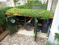 Living roof bike shed. Porch Bike Storage, Lean To Bike Storage, Small Bike Shed, Bycicle Shed Bike Storage, Front Garden Storage Ideas, Bin And Bike Storage Front Garden, Bin And Bike Storage, Outdoor Bike Storage Small Spaces, Hidden Bike Storage