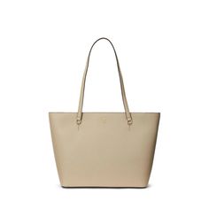 A versatile and enduring must-have accessory, the LAUREN Ralph Lauren® Crosshatch Leather Medium Karly Shopper Tote is detailed with a metal 'LRL' logo at the front for a signature touch. Crafted with crosshatch leather for subtle texture and refined style. It's designed with a spacious silhouette and a myriad of pockets for storing your essentials..Two top handles..Top zippered closure..One exterior slip pocket and one zippered pocket and slip pocket at the interior..Foil-printed 'Lauren Ralph Lauren' logo at the exterior slip pocket..'Lauren Ralph Lauren'–engraved metal plaque in the interior..Polyester lining..Imported..Please note, the hardware color and interior lining may differ from the color shown in the photo..Measurements: Bottom Width: 13 in Depth: 4 1/4 in Height: 9 in Strap Le Classic Bags With Metal Hardware For Everyday Luxury, Classic Everyday Bags With Metal Logo, Everyday Gold Bag With Metal Logo, Everyday Gold Bags With Metal Logo, Gold Bags With Metal Logo For Everyday Use, Classic Rectangular Bags With Metal Logo, Classic Tan Bag With Metal Hardware, Classic Tan Bags With Metal Hardware, Classic Shoulder Bag With Metal Logo For Everyday