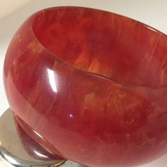 Fabulous red cherry juice Bakelite cuff bangle. Luminous, heavy, transparent marbled bangle. Glows in the light. See pics. Measurements 1 7/16 wide and 2 9/16 inside. A truly beautiful bangle worthy of any collection. Guaranteed vintage Bakelite. Overages in shipping are promptly refunded. Martini Set, Cherry Juice, Vintage Bakelite, Red Cherry, Cuff Bangles, Cool Items, Cherry Red, Vintage Fabric, Kind Words