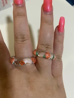 These simple rings add extra style to any outfit 💖! There are 12 available fruit options for your ring! Rings come in 5 different ring sizes, allowing them to be fashionably stacked on your fingers! It's an amazing gift idea for teens and adults 💖! All orders come with a cute sticker and a note! Since this item is totally handmade by me, I try my very hardest to avoid air bubbles, however, they do still appear sometimes. This only makes your item more unique and special as it was made by hand Fruit Rings, Simple Rings, Jackson Heights, Ring Sizes, Air Bubbles, Rings Simple, Stackable Rings, Cute Stickers, To My Daughter