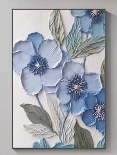 blue flowers painted on a white wall with green leaves