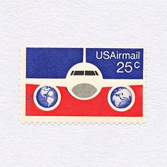 a postage stamp with an airplane and globe on it