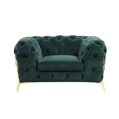 a green velvet couch with gold legs and buttons on the back, sitting in front of a white background