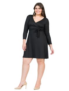 This long-sleeve plus size dress hits just above the knee and features a classic wrap-style closure and construction, a V-neck, and a tie closure along the waist to enhance a feminine silhouette. Perfect for a wedding guest or a night out.material: 92% poly, 8% spandexmodel height: 5'10.5" Black Long Sleeve Wrap Dress For Fall, Black Wrap Dress With Surplice Neckline For Fall, Black V-neck Surplice Neckline Dress For Fall, Black Wrap Dress For Fall, Black Wrap Dress For Fall Workwear, Solid Color V-neck Wrap Dress For Fall, Black Wrap Dress With Surplice Neckline And Faux Wrap, Long Sleeve Solid Color Wrap Dress For Fall, Long Sleeve Solid Wrap Dress For Work