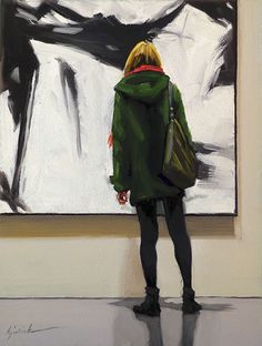 a woman standing in front of a painting on the wall with her back to the camera