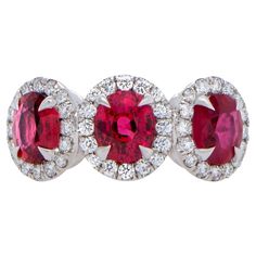 It comes with the appraisal by GIA GG/AJP 3 Rubies = 2.37 Carats 62 Round Diamonds = 0.84 Carats All Gemstones are Natural Metal: 18K White Gold Ring Size: 6.25* US *It can be resized complimentary Ruby Ring Designs, Dreamy Jewelry, Jewelry Upcycle, Ruby Rings, Radiant Red, Ruby Diamond Rings, Bracelet Love, 3 Stone Rings, Hand Ring