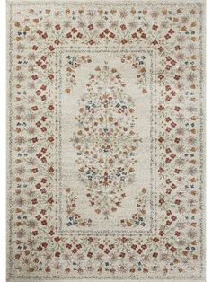 a white rug with an ornate design on the center and sides, in various colors