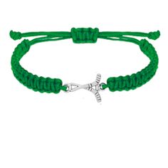 a green cord bracelet with a silver cross on it