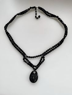 Antique Victorian Whitby Jet & French Jet Hand Carved Mourning Necklace 25" It's a beautiful, massive, statement piece, the smaller beads are French Jet, the big, hand-carved beads and the pendant are Whitby Jet. Payment is expected within 2 days of purchase, if no payment is made, the item will be relisted at the seller's discretion. Please view all the photos, they are an important part of the description. I do my best to photograph and describe them as honestly and accurately as possible. Offers welcome! Thanks for looking Victorian Style Black Pendant Jewelry, Antique Black Necklace With Large Pendant, Handmade Antique Black Necklace, Black Victorian Necklace, Ornate Handmade Black Necklace, Jet Jewelry, Pretty Clothes, Antique Victorian, Statement Pieces