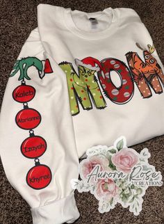 Personalized sweatshirts! 4 ornaments MAX per arm Sublimation design!  Unisex sweatshirt 50/50 cotton polyester Wash inside out in cold water! Hang dry or tumble dry. Grinch Hoodie, Grinch Christmas Sweater, Personalized Sweatshirts, Grinch Shirts, Embroidered Jean Jacket, Grandma Sweater, Christmas Grinch, Mom Sweater, Funny Christmas Sweaters