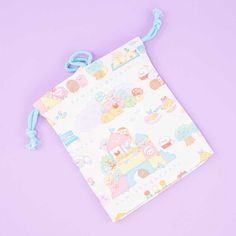 a small drawsack bag on a purple background