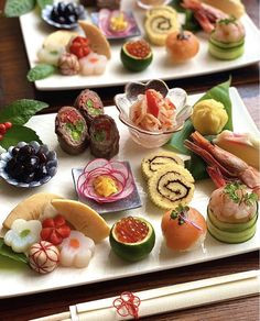 there are many different types of sushi on this plate