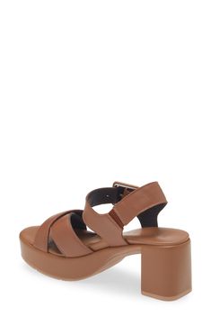 A chunky heel and platform give classic '90s-inspired style to a strappy leather sandal fitted with a cushy footbed for comfort. 2 3/4" heel; 1 1/2" platform (size 39) Adjustable ankle strap with buckle closure Cushioned footbed with arch support Leather upper and lining/synthetic sole Imported Leather Double Strap Heels With Padded Heel, Leather Double Strap Sandals With Padded Heel, Double Strap Leather Sandals With Padded Heel, Leather Sandals With Padded Heel And Double Strap, Leather Double Strap Sandals With Stacked Heel, Leather Sandals With Stacked Heel And Double Strap, Chic Brown Chunky Platform Sandals, Modern Leather Heels With Double Strap, Leather Sandals With Chunky Platform And Block Heel