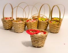 several small baskets filled with different types of food