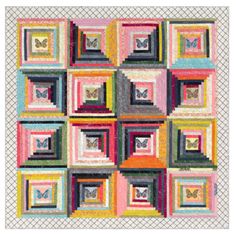 a colorful quilt with squares and butterflies on it