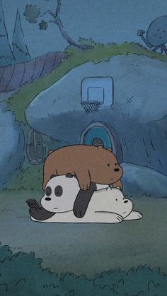 two dogs are laying on the ground in front of a rock house with a basketball hoop