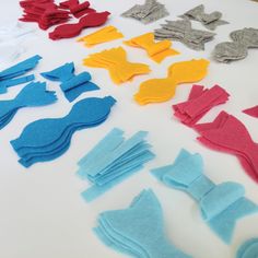 several pieces of felt are laid out on a table