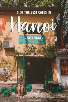 a woman sitting on a bench in front of a building with the words, 5 of the best cafes in henoi vietnam