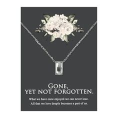 a necklace with flowers on it that says, gone yet not forgotten what we have enjoyed