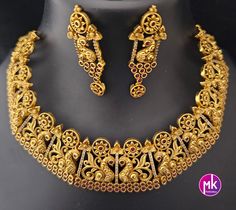 Premium Peacock Traditional matte gold finish big Bridal Necklace with AD Stones with Matching Big Earrings -  MK Fashionkart Material: Premium Matte gold finish, AD stones Earrings: Matching Earrings Suitable for Saree/Salwar/party wear dresses Adjustable length    SHIPPING : Ready to ship in 1 business day. This item will be shipped from The United States. Jewelry care instructions : 1. Please wipe the jewelry with a piece of cotton cloth after usage.  2. Store the jewelry in a cool, dry and air tight box or pouch.  3. Make sure the jewelry is away from direct heat and water. 4. Please wipe of any moisture, sweat, soap water after usage. Elegant Gold Sets With Peacock Design, Elegant Gold Set With Peacock Design, Gold Sets With Peacock Design For Festive Season, Festive Gold Sets With Peacock Design, Traditional Gold Sets With Peacock Design, Diwali Gold Sets With Peacock Design, Earrings Matching, Stones Earrings, Antique Bridal Jewelry