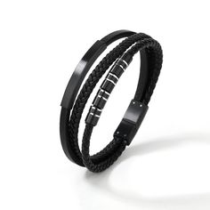 Crafted from high-quality genuine leather and black-plated stainless steel, the Nightfall Leather Bracelet combines rugged durability with sleek style. The bracelet features a braided leather design and striking black-plated stainless steel accents. With an approximate size of 14mm in width and 8.0 inches in length, this bracelet offers a perfect fit and modern elegance. Ideal for everyday wear or special occasions, it adds a touch of urban style to any outfit. * ＤＥＴＡＩＬＳ - Material: High-quality Modern Black Leather Bracelet With Stainless Steel Clasp, Modern Leather Bracelet With Metal Black Band, Modern Metal Leather Bracelet With Black Band, Black Leather Bracelet With Leather Strap, Black Leather Bracelets With Leather Strap, Black Leather Wristband With Bracelet Strap, Black Leather Jewelry With Black Band, Black Leather Band Jewelry, Black Leather Strap Bracelets