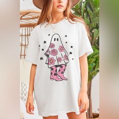 Oversized Fit T-Shirt With Retro Distressed Pink Flowers Ghost Wearing Cowboy Boots With Star Background. Vintage White / Soft 100% Ring-Spun Cotton / Crew Neck T-Shirt. Cute Oversized White T-shirt, Cute Oversized T-shirt For Spring, Oversized Cute Spring T-shirt, Cute Oversized Spring T-shirt, Cowgirl Boots Graphic, Floral Cowboy Boots, Yellow Striped Shirt, Ghost Graphic, Turquoise Shirt