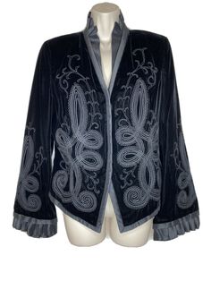 Carmen Marc Valvo Black Velvet Embroidered Ruffled Jacket Sz 12 NEW NWT $525. Condition is New with tags. Shipped with USPS Priority Mail. New with tags. Beautifully embroidered heavy weight well made blazer. ✅ also for sale matching St. John Evening velvet wide leg pants new with tags in size 12. Please message me if you would like them as a set. Measurements: underarm to underarm: 20 inches, length 24.5 inches, sleeves from shoulder seam 26.5 inches, shoulder seam to shoulder seam 15.5 inches. Chic Long Sleeve Embroidered Blazer, Designer Embroidered Blazer For Fall, Embroidered Fitted Evening Outerwear, Embroidered Long Sleeve Evening Blazer, Fitted Embroidered Evening Outerwear, Long Sleeve Embroidered Evening Blazer, Embroidered Fitted Outerwear For Evening, Embroidered Evening Blazer For Winter, Designer Embroidered Evening Outerwear